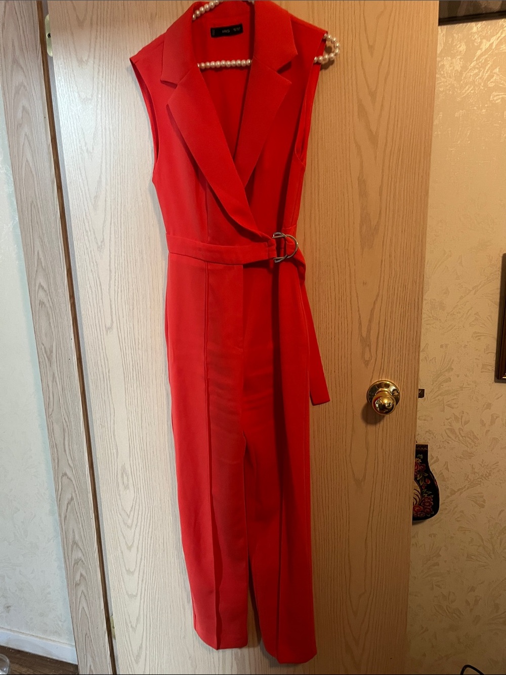 Sleeveless Red Belt Jumpsuit with Tailored Lapel